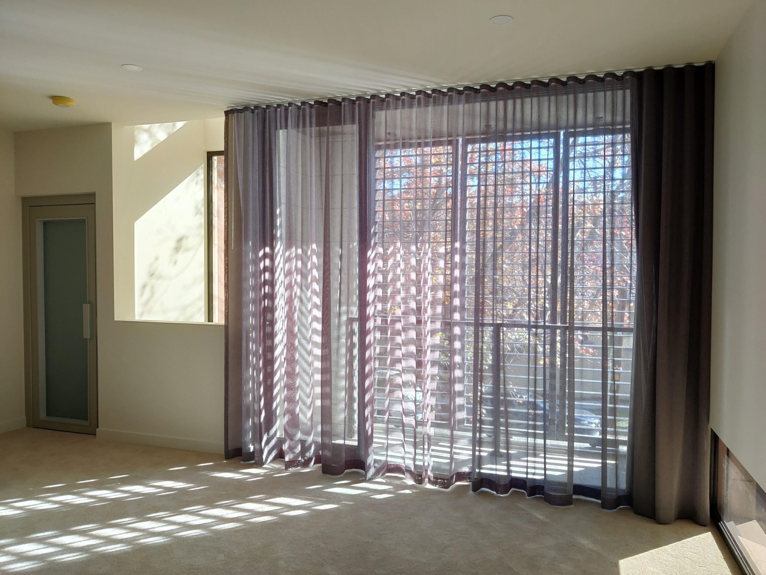 sheer curtains over roller blinds